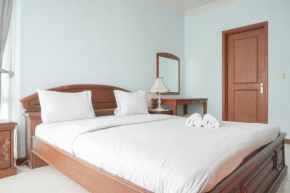 Elegant and Homey 2BR Apartment at Puri Casablanca By Travelio